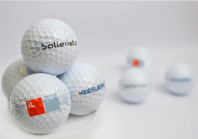 different logos printed on golf balls